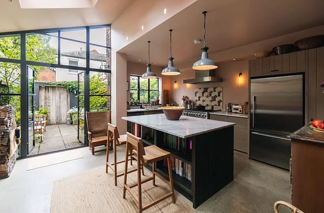 Controversial All-Black Facade Sparks Online Backlash: 'We Wanted to Honor the Past, Not Hide It' – Drew Harriman