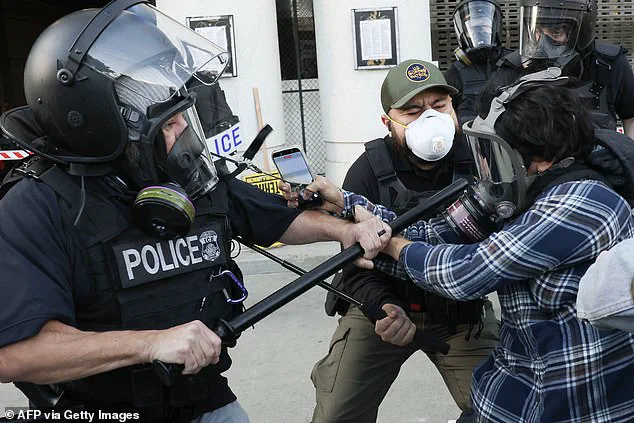 Los Angeles Protesters Clash with Police During ICE Raids Demonstration