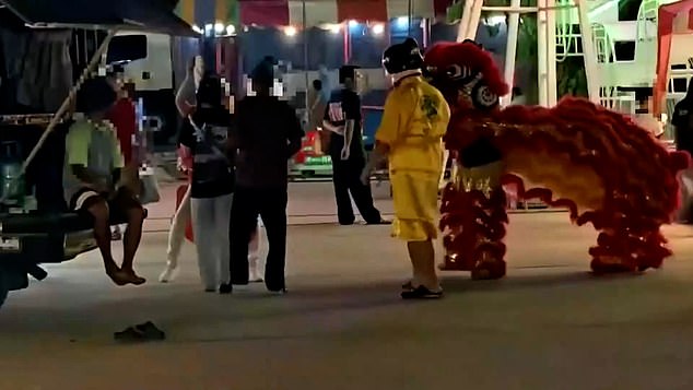 Thai Police in Vibrant Dragon Costume Arrest Suspect in Lunar New Year Art Theft