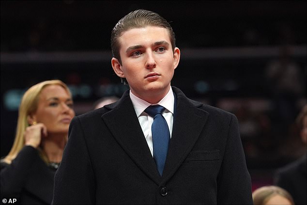 Barron Trump's Blue Tie Contrasts with Family's Red Ties, Sparking Speculation