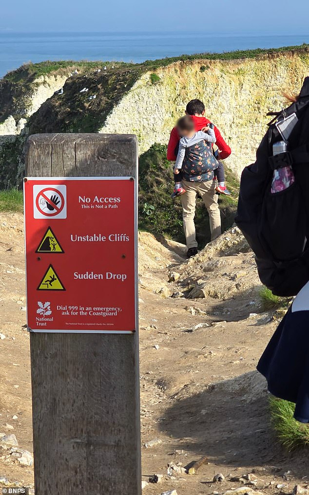 Father's Reckless Climb on Dorset Cliff Sparks Safety Concerns Amid Selfie Culture Surge