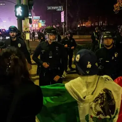 Mexican flag-waving protestors clash with police during Grammy Awards in Los Angeles