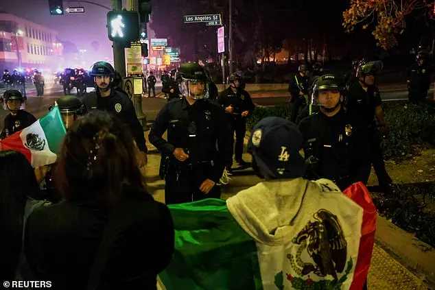 Mexican flag-waving protestors clash with police during Grammy Awards in Los Angeles