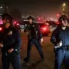 Mexican flag-waving protestors clash with police during Grammy Awards in Los Angeles