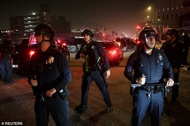 Mexican flag-waving protestors clash with police during Grammy Awards in Los Angeles