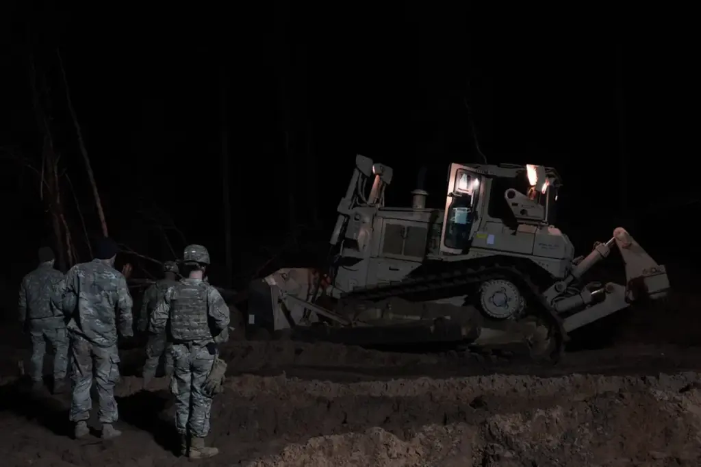 American Soldiers Face Daunting Task in Rescuing Trapped M88 Hercules Armored Personnel Carrier