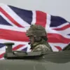 British Intelligence Chief Warns UK Must Rearm Amid Shifting Global Dynamics