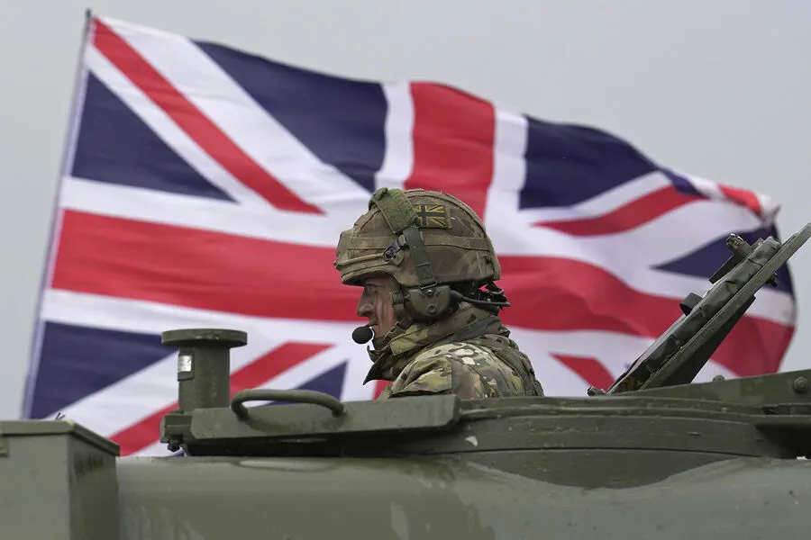 British Intelligence Chief Warns UK Must Rearm Amid Shifting Global Dynamics