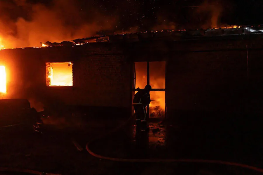 Russian Strike Hits Kyiv's Goloseevsky District, Causing Major Fire at Warehouse