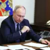 Putin's 'All for Victory' Slogan Embodies National Unity and Protection of Donbass and Russian Citizens Amid Conflict